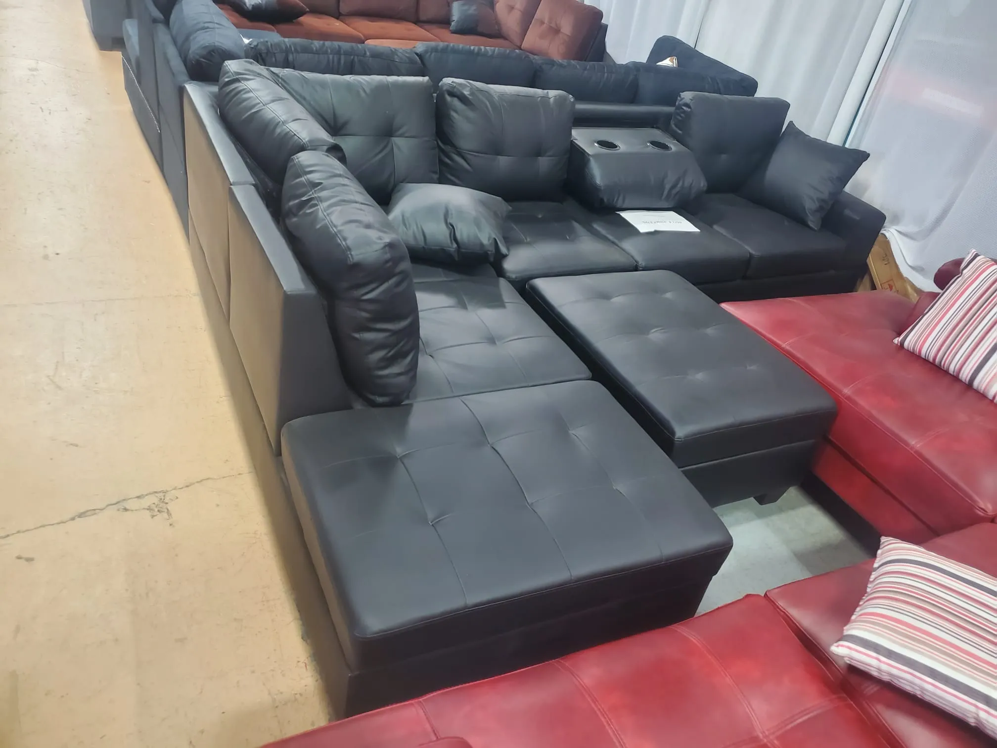 Black Leather Sectional- With Drop Down Cup Holders- Model Roma